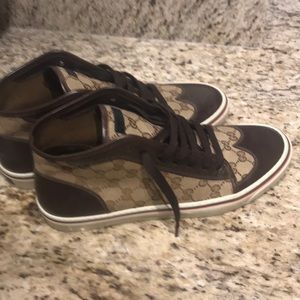 A fairly used Gucci sneakers.